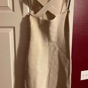An above the knee cream BeBe bodycon dress
